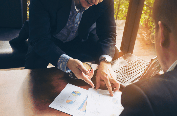 Financial Planner at St. Charles Financial Services Showing Client What A Financial Planner Does